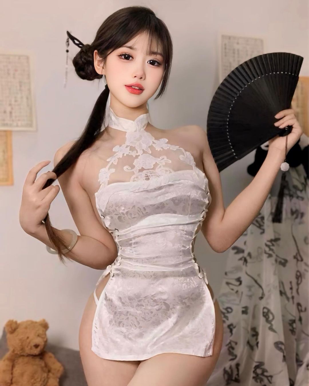 ชุดกี่เพ้างานคล้องคอสายไขว้ผูกข้าง สไตล์สุดหวานปนเซ็กซี่-3